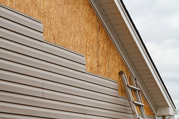 Professional Emergency Siding Repair technician working in Savage, MN